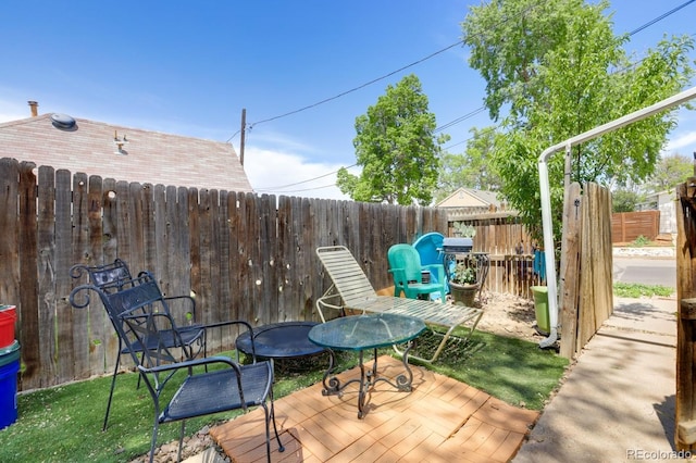 3000 S Sherman St, Englewood, CO 80113 - wooden deck with a fenced backyard