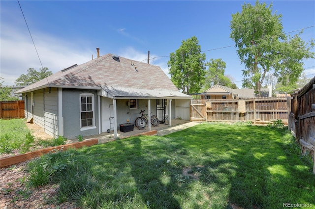 3000 S Sherman St, Englewood, CO 80113 - rear view of property with roof with shingles