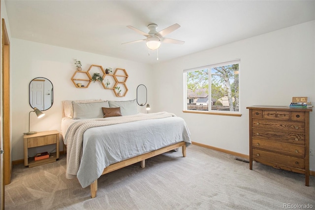 2045 Parkwood Dr, Johnstown, CO 80534 - carpeted bedroom with baseboards and a ceiling fan