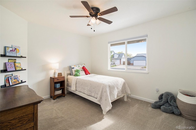 2045 Parkwood Dr, Johnstown, CO 80534 - carpeted bedroom with baseboards and ceiling fan
