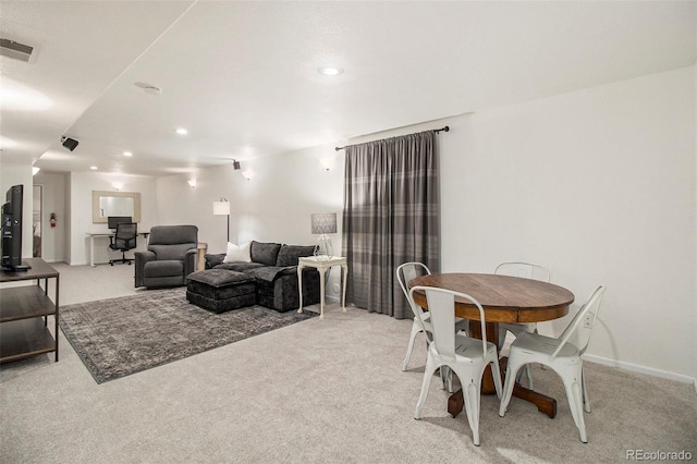 2045 Parkwood Dr, Johnstown, CO 80534 - dining room with light colored carpet and recessed lighting