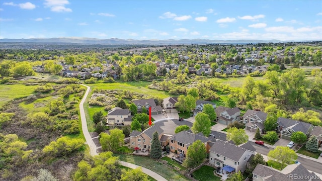 aerial perspective of suburban area featuring a mountainous background