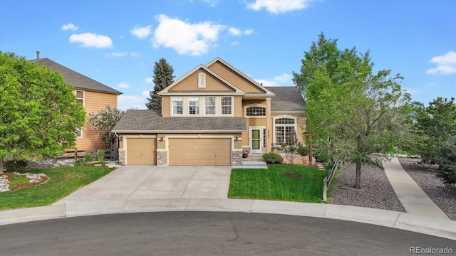 view of front of property featuring stucco siding, driveway, stone siding, a front yard, and an attached garage