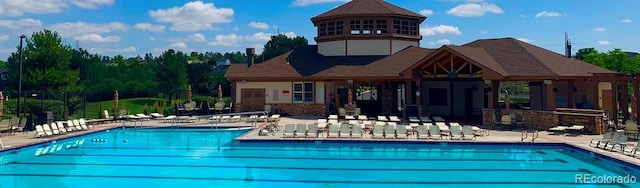 22302 Quail Run Way, Parker, CO 80138 - community pool featuring a patio area