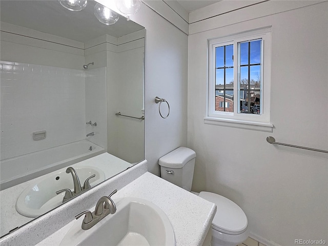 full bathroom featuring shower / washtub combination, toilet, and vanity