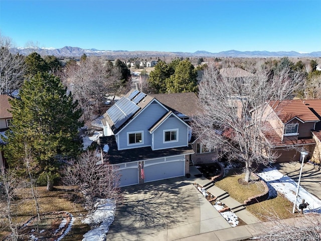 drone / aerial view featuring a mountain view