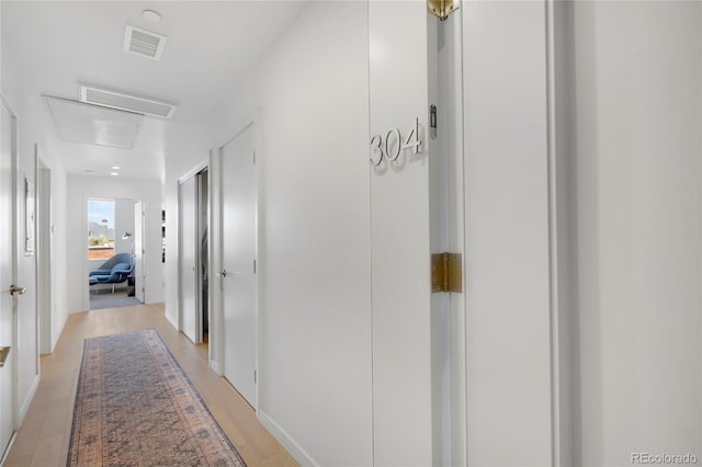 1300 N Ogden St Unit 304, Denver, CO 80218 - hall featuring light wood-style flooring