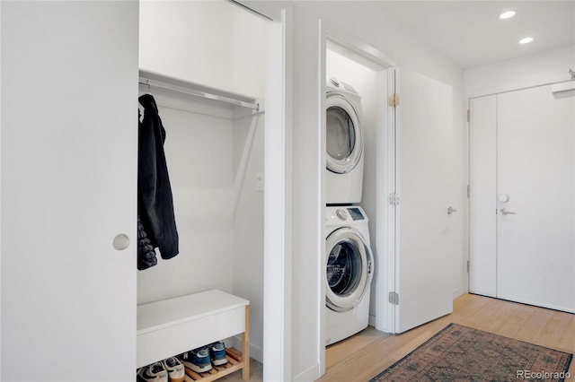 1300 N Ogden St Unit 304, Denver, CO 80218 - laundry area with stacked washer / dryer, recessed lighting, and wood finished floors