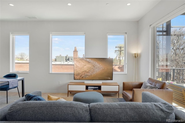1300 N Ogden St Unit 304, Denver, CO 80218 - living area with plenty of natural light and recessed lighting