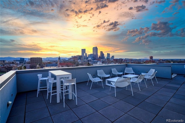 1300 N Ogden St Unit 304, Denver, CO 80218 - view of patio featuring a skyline view