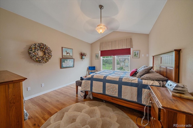 22124 E Euclid Dr, Aurora, CO 80016 - bedroom featuring wood finished floors and vaulted ceiling