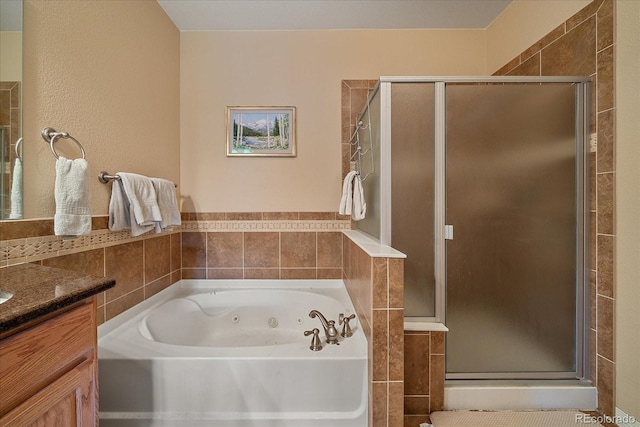 22124 E Euclid Dr, Aurora, CO 80016 - bathroom with a whirlpool tub, a shower stall, and vanity