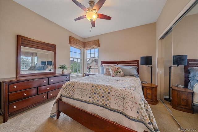 22124 E Euclid Dr, Aurora, CO 80016 - bedroom with light carpet, a closet, and ceiling fan