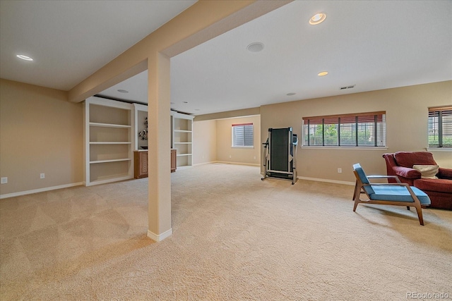 22124 E Euclid Dr, Aurora, CO 80016 - living area with light colored carpet, healthy amount of natural light, and recessed lighting