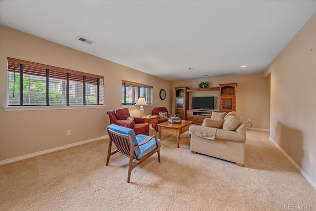 22124 E Euclid Dr, Aurora, CO 80016 - living area with light colored carpet, healthy amount of natural light, and recessed lighting