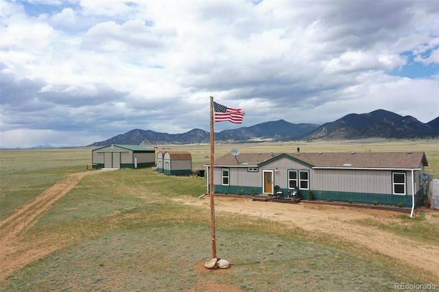 463 Snowshoe Ln, Lake George, CO 80827 - view of front of house with a mountain view and a front yard