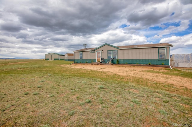 463 Snowshoe Ln, Lake George, CO 80827 - view of front of home with a front yard and an outbuilding