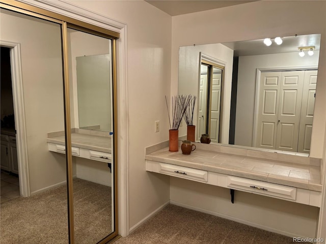 bathroom featuring baseboards