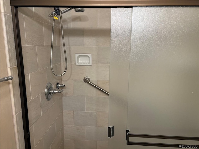 bathroom featuring a shower stall