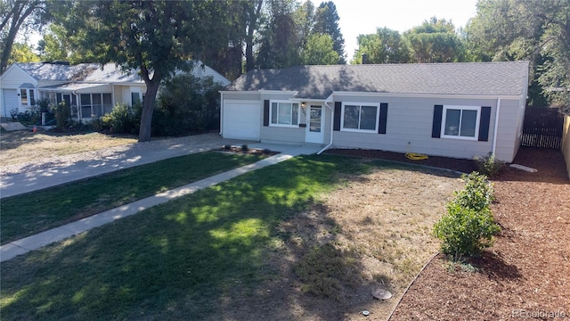 ranch-style home with a front lawn