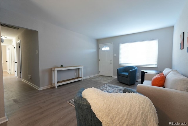 living room with wood-type flooring