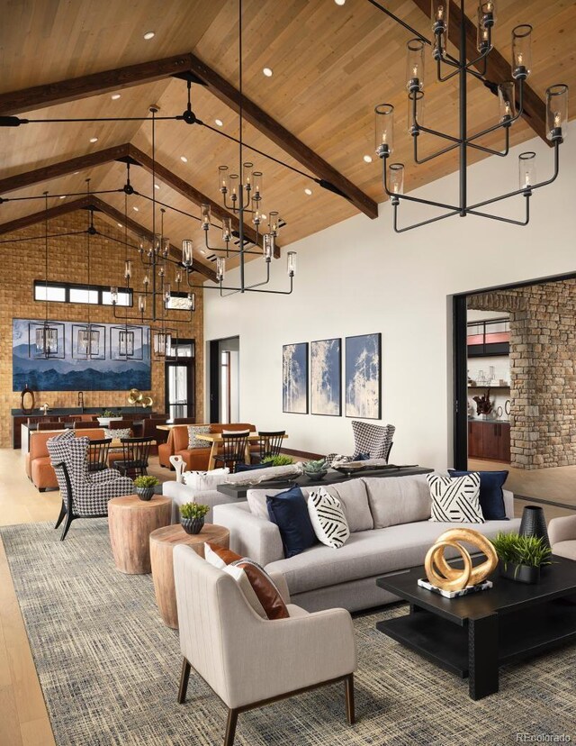 living room with wooden ceiling, high vaulted ceiling, a chandelier, beamed ceiling, and wood finished floors