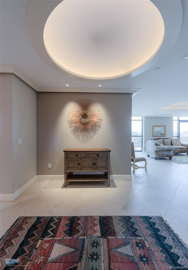 1077 Canyon Blvd Unit 403, Boulder, CO 80302 - hallway featuring light tile patterned flooring, a wealth of natural light, and a tray ceiling