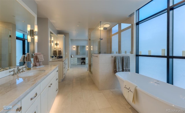 1077 Canyon Blvd Unit 403, Boulder, CO 80302 - bathroom with vanity, floor to ceiling windows, plenty of natural light, and shower with separate bathtub