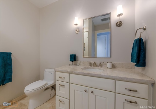 1077 Canyon Blvd Unit 403, Boulder, CO 80302 - bathroom featuring tile patterned floors, vanity, and toilet