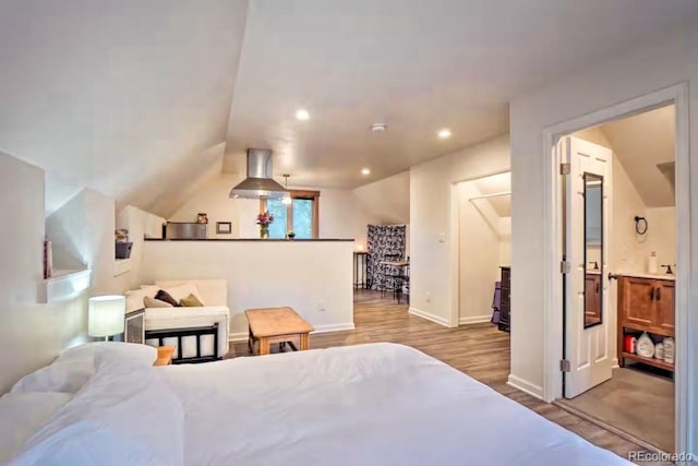 201 Nuthatch Dr, Alma, CO 80420 - bedroom featuring wood finished floors, vaulted ceiling, baseboards, and recessed lighting