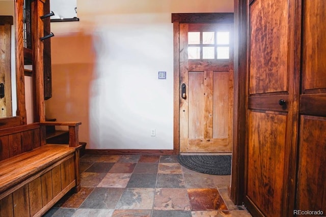 201 Nuthatch Dr, Alma, CO 80420 - foyer entrance featuring dark stone finish floors and baseboards