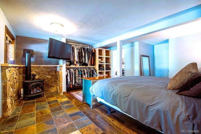 201 Nuthatch Dr, Alma, CO 80420 - bedroom featuring a wood stove