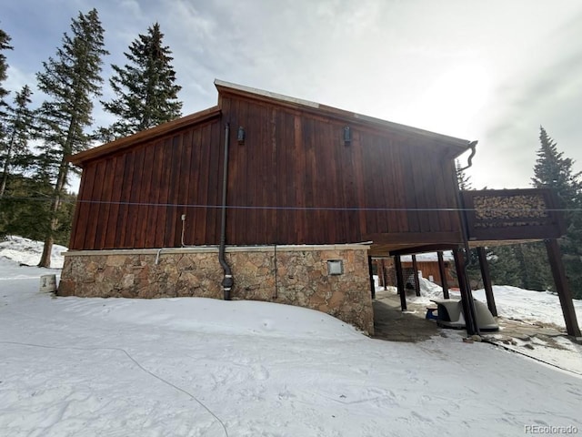 201 Nuthatch Dr, Alma, CO 80420 - view of snowy exterior with stone siding