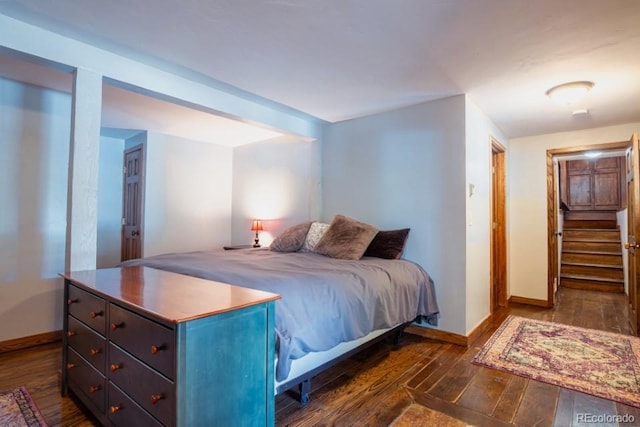 201 Nuthatch Dr, Alma, CO 80420 - bedroom featuring dark wood-style flooring and baseboards
