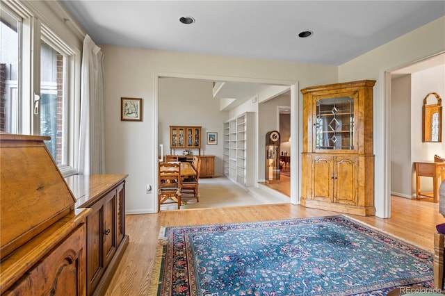 6895 S Norfolk St, Foxfield, CO 80016 - foyer entrance with light wood finished floors and baseboards