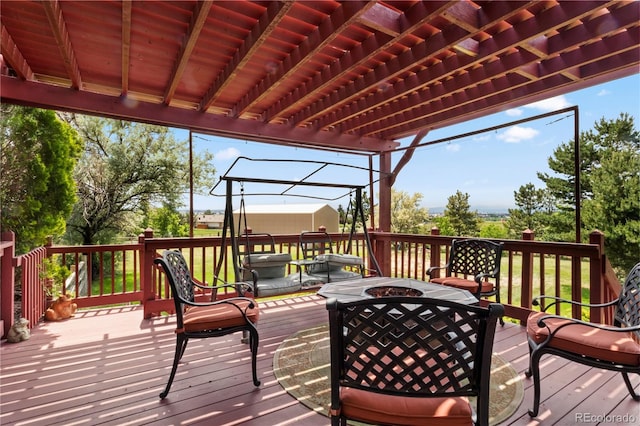 6895 S Norfolk St, Foxfield, CO 80016 - wooden terrace featuring a fire pit