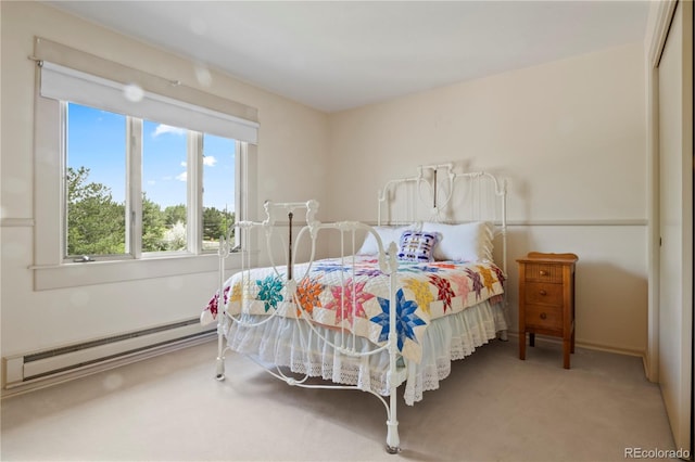 6895 S Norfolk St, Foxfield, CO 80016 - bedroom with baseboard heating and carpet flooring