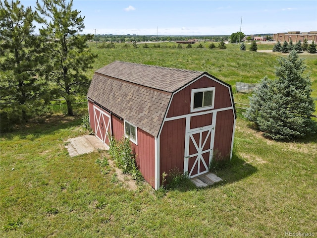 6895 S Norfolk St, Foxfield, CO 80016 - view of barn featuring a lawn and a view of countryside