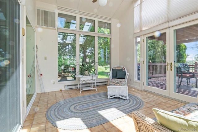 6895 S Norfolk St, Foxfield, CO 80016 - sunroom featuring french doors, baseboard heating, tile patterned flooring, a high ceiling, and a ceiling fan