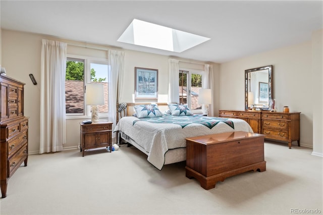 6895 S Norfolk St, Foxfield, CO 80016 - bedroom featuring a skylight, multiple windows, and light colored carpet