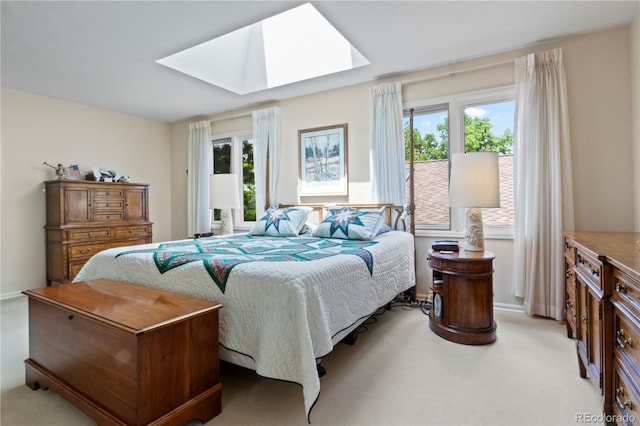 6895 S Norfolk St, Foxfield, CO 80016 - bedroom with a skylight and light colored carpet