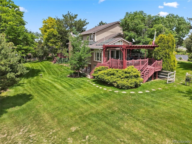 6895 S Norfolk St, Foxfield, CO 80016 - back of house with a deck and a yard