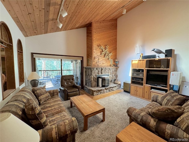 carpeted living room with high vaulted ceiling, a wood stove, and wooden ceiling