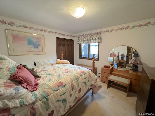 bedroom with light colored carpet and a baseboard radiator