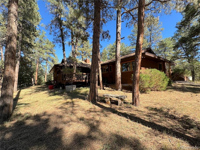 exterior space featuring a wooden deck