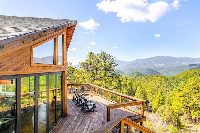 wooden terrace with a mountain view