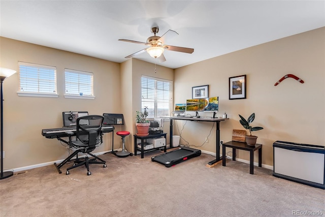 office with baseboards, a ceiling fan, carpet flooring, and visible vents