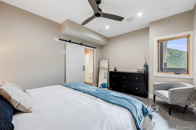 bedroom featuring a barn door, visible vents, a ceiling fan, tile patterned floors, and recessed lighting