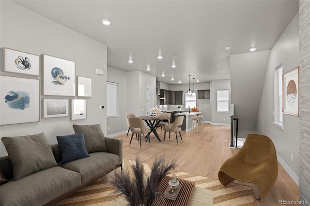 16605 Peak St, Broomfield, CO 80023 - living room with light wood-style floors and recessed lighting