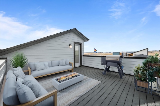 16605 Peak St, Broomfield, CO 80023 - wooden terrace with an outdoor living space with a fire pit and area for grilling